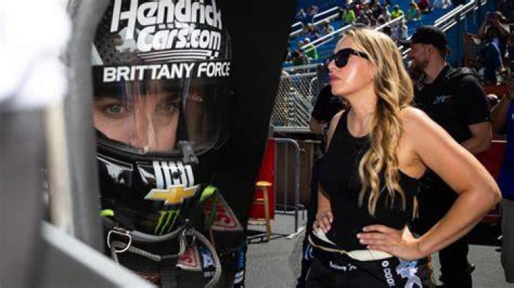 Brittany Force throws the first pitch Horsepower & Heels