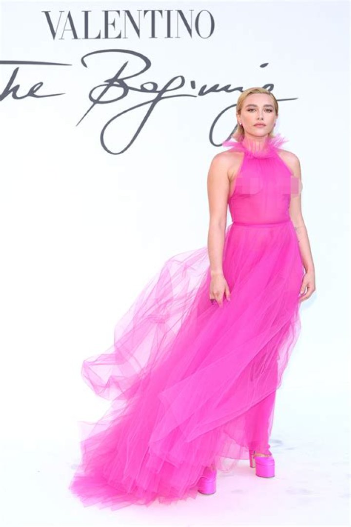 Florence Pugh rocks sheer pink dress at Valentino show