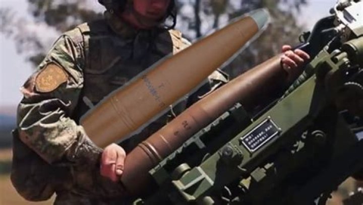 How heavy is a 122 mm shell?