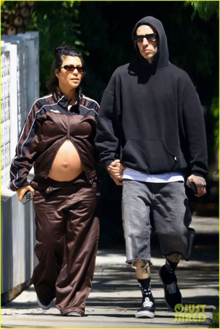 Kourtney Kardashian&rsquo;s big baby bump revealed as she goes topless and