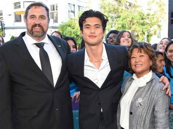 (LR) Dad Phil Melton, Charles Melton and Mom Sukyong Melton at "The