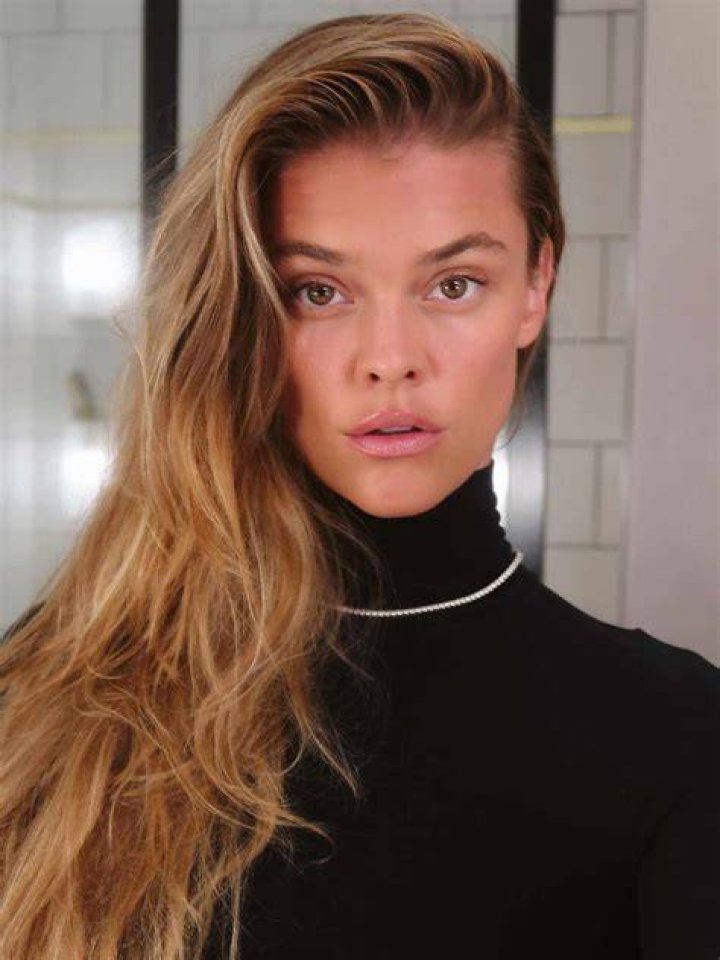 Nina Agdal's boyfriend Jack BrinkleyCook kisses her on the cheek in