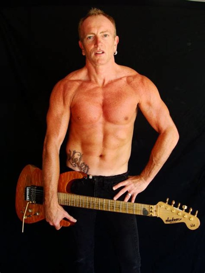 Phil Collen (L) and his wife Helen Simmons visit 'Rain A Tribute To
