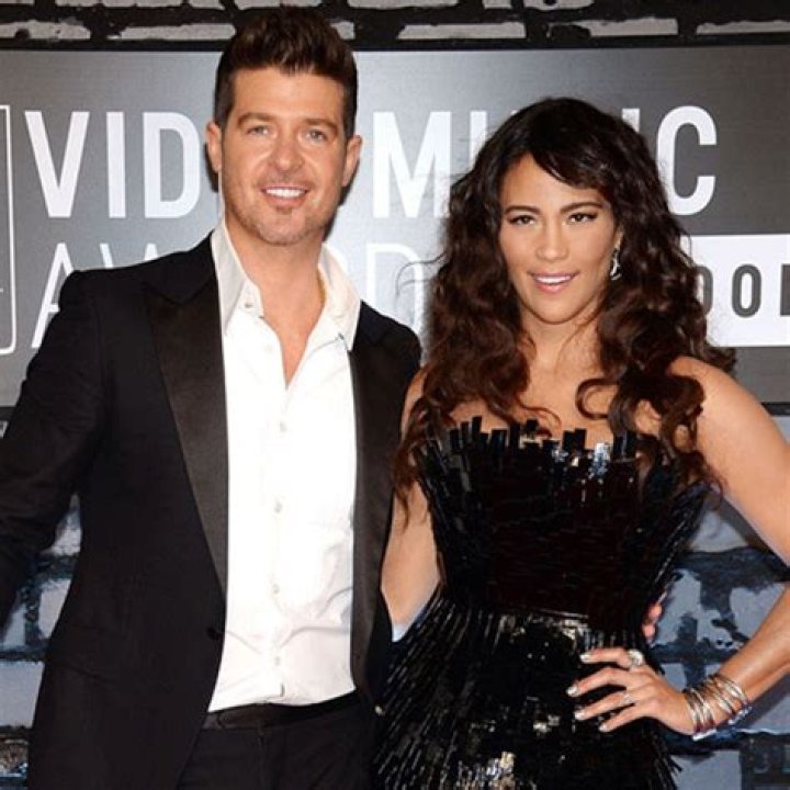 Robin Thicke, Paula Patton Had a ThreeWay Relationship With Masseuse