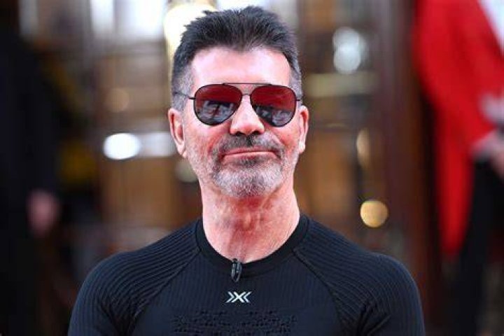 Simon Cowell sports a black eye after getting knocked in the face by