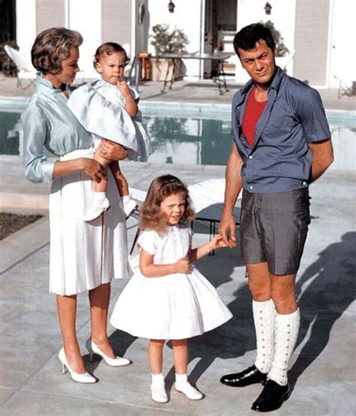 Tony Curtis and Leigh play with their daughters, future TV